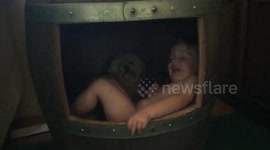 Don't blink or your baby will be naked in a dog house