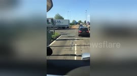 Newsflare Edit - Thousands of potatoes spill out of lorry in Cheshire, UK