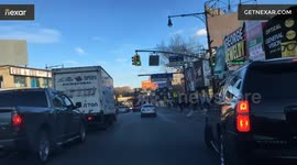 Cyclist falls from tight squeeze on Fordham Road, Bronx, NY