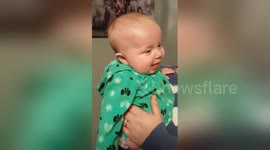 This baby laughing will put an instant smile on your face
