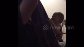 Baby's hilarious reaction to dad shaving beard