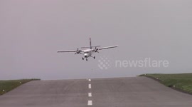 Plane struggles to land in high winds