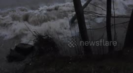 Erosion and landslide by Lake Ontario strong waves, record high water levels