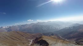 Paraglider performs 5000-metre-high flight above breathtaking Himalayas