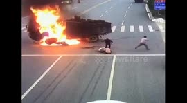 Motorcyclist burned in fire after crashing into lorry