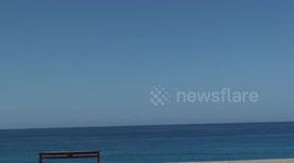 Rescue parachute fall to the sea.