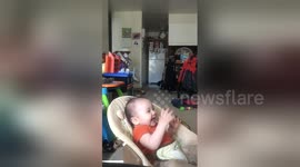 Baby has the cutest reaction to being 'shot'