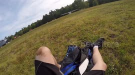 Skydiver survives crash landing, hits the ground knees first and bounces