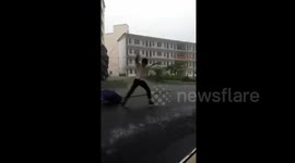 Boy nearly struck by lightning when he shows off dance in rain