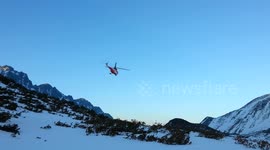 Rescue  landing in snow mountains