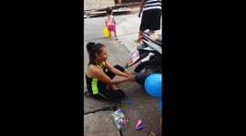 Only in thailand. Crazy Nam blowing up party balloons