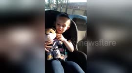 Doctor gives little girl a teddy bear with hearing aids like her