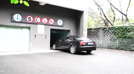 Vehicles use lifts to reach car park on the top of the building