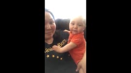 Baby loves mom so much he cries even when shes holding him
