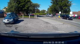 a very small child stood up in the back of a big mercedes