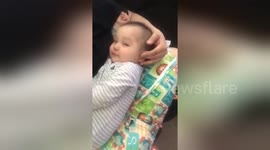 Newsflare Edit - Baby falls asleep to ear massage