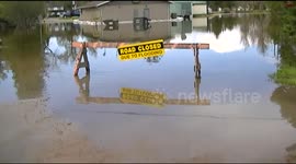 Liquor Store Submerged by overflowing river