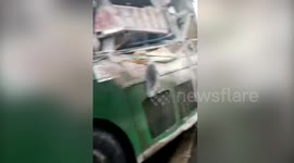 Bus collides with lorry killing ten in southern China
