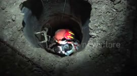 Firefighters rescue mum and daughter falling into deep well