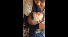 Fidget spinner on baby's head