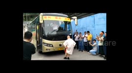 Chinese 'kung-fu master' pulls a coach with his private parts