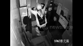 Woman trapped in lift pushes doors to open with bare hands