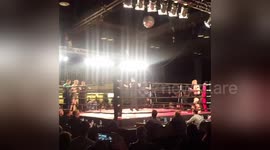 MMA fighter goes to touch gloves, the other fighter knocks him out