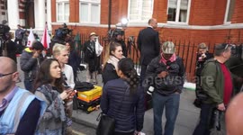 Julian Assange speaks at the Ecuador embassy