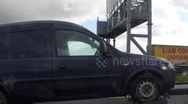 00WX8801 Kavanagh Crane Hire On his mobile drinking coffee while driving M50