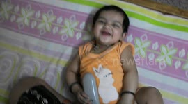 Cute baby laughing