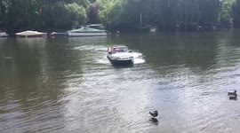 Amphibious car casually exits the Thames at Richmond