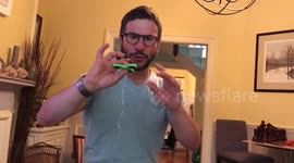 Man uses fidget spinner to illustrate scientific principles