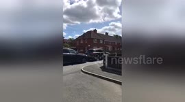 Newsflare Edit - Police raid Fallowfield house after Manchester terror attack