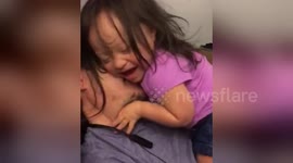 Father's infectious laughter delights toddler with Down Syndrome in heartwarming video
