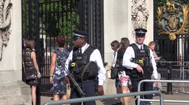 Extra armed police guarding Buckingham Palace