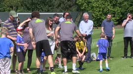 Diego Costa greets fans before training