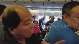 Man in Trump Hat Calls Woman a Lesbian on United Flight 87 Shanghai to Newark UA87