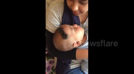 Newsflare Edit - Fidget spinner on baby's head