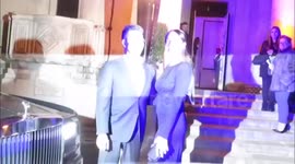 Simon Cowell and Lauren Silverman kiss on the red carpet