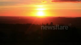Sunset on dartmoor overlooking the city of plymouth devon uk