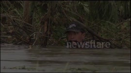 Crocodile hunter rescued from flooded Mc Leod River in Australia