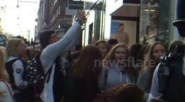 Teenagers jostle to catch a glimpse of The Vamps at an in-store event