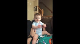Baby goes from happy to dad on command