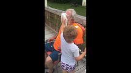 Boy gets to slam pie in grandfather's face for being good at school