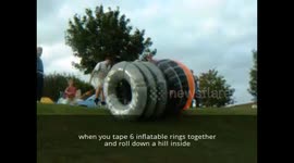 when you tape 6 inflatable rings together and roll down a hill inside