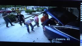 Dramatic CCTV footage shows Tesla crash into shop