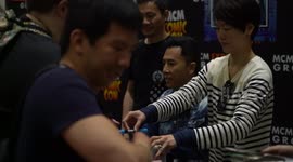 Hong Kong actor Donnie Yen signing autograph at MCM London Comic Con 2017
