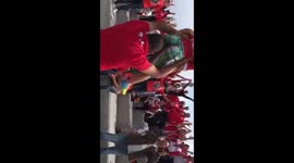 Young fan leads football chant ahead of match in Turkey