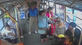 Man does gymnastic exercises on bus in China