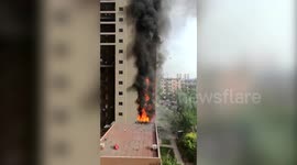 huge fire breaks out in residential building in northern China